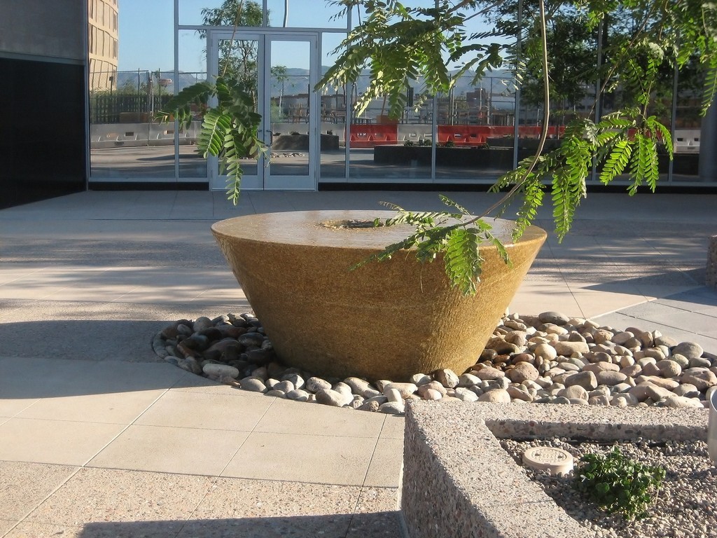 Core-Drilled Gobi Tan Granite with Perfectly Level Surface for Laminar Water Flow - HDG Building Materials