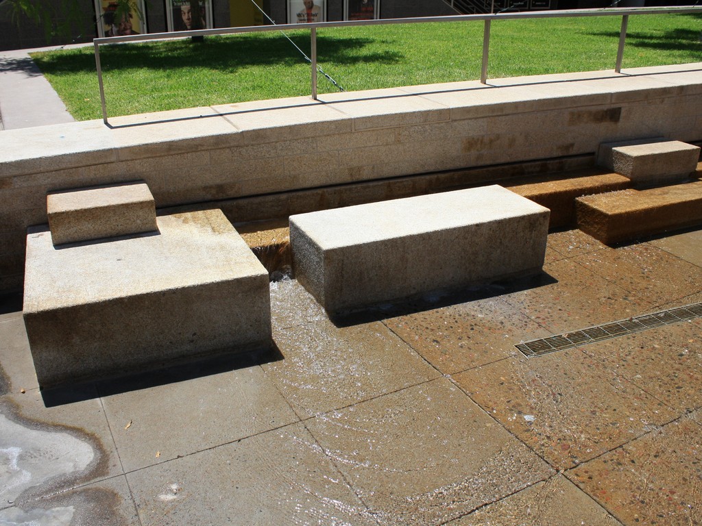 Gobi Tan Cubic Stone Granite Blocks in Fountain Courtyard