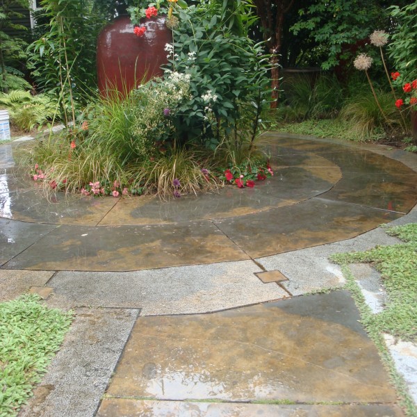 Rusty Caviar Blue Limestone Patio Features Honed and Lychee Finishes