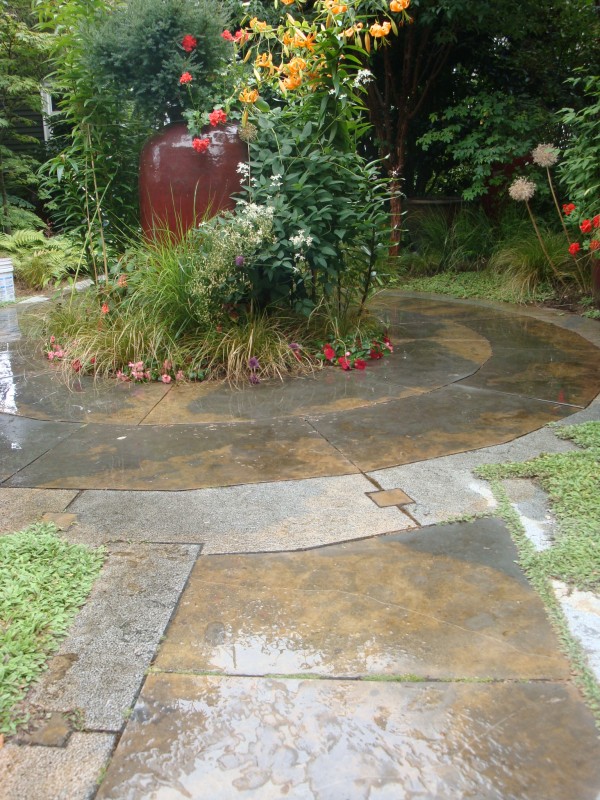 Rusty Caviar Blue Limestone Patio Features Honed and Lychee Finishes