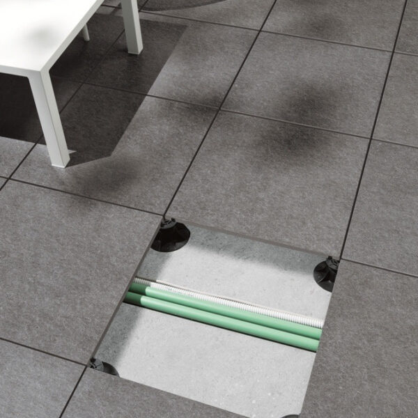 Porcelain Pavers over Pedestals Provide Access to Electrical, Plumbing, Irrigation and other Services Below the Decking Surface.