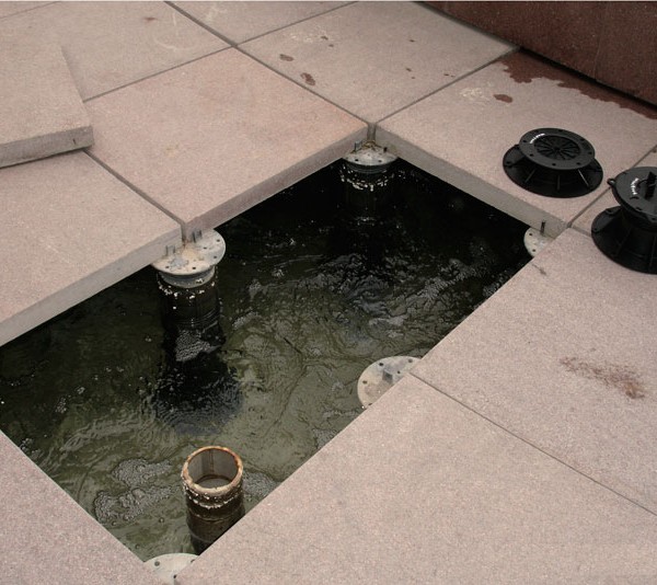 image Buzon Pedestals with water feature services hidden below surface - HDG Building Materials