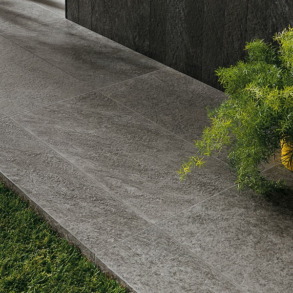 Patio Walkway and Planter Wall with HDG Geyser Quartzite Porcelain Pavers.