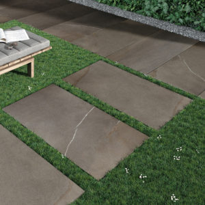 HDG Pietra Pavero Brown Porcelain Pavers EP06 Placed on Grass - HDG Building Materials