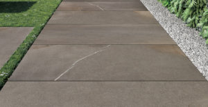HDG Pietra Pavero Brown Porcelain Pavers EP06 on Grass and Gravel - HDG Building Materials