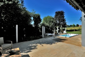 Pool Surround with HDG Trust Gold Porcelain Pavers and Ipe Wood Decking