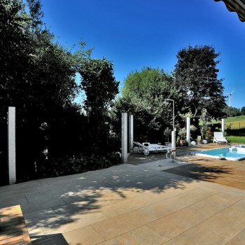 Pool Surround with HDG Trust Gold Porcelain Pavers and Ipe Wood Decking
