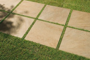 HDG Trust Gold Porcelain Pavers Installed Over Grass - Can Also Be Installed on Buzon Pedestals