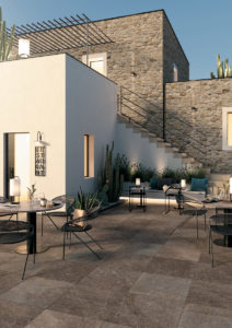 Outdoor Courtyard with HDG Pietra Pavero Plum Structural Porcelain Pavers - HDG Building Materials