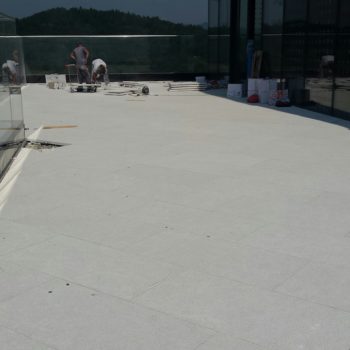 Structural Porcelain Pavers Over Buzon Screwjack Pedestals - HDG Building Materials