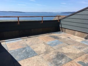 Waterfront rooftop deck with HDG Pietra Jamba Slate Porcelain Pavers