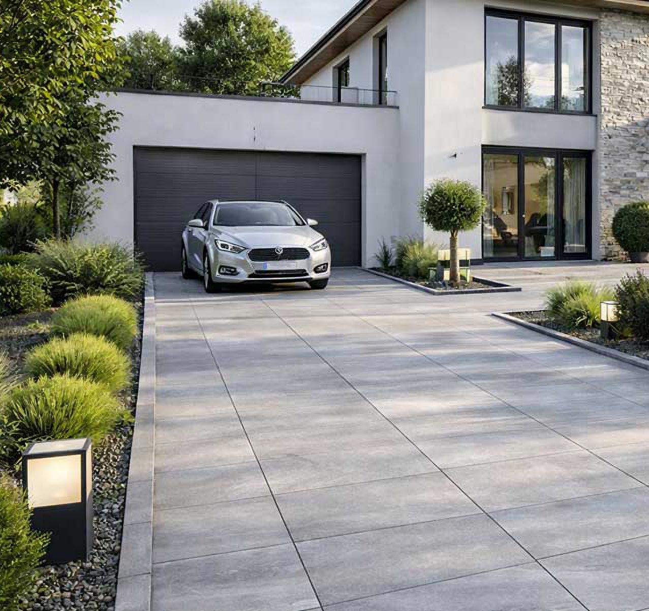 Driveway for modern house with HDG Colo-Tipo 3CM Driveover Porcelain Pavers