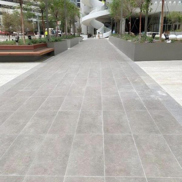 HDG Ombra Taupe porcelain pavers installed in an outdoor commercial plaza area
