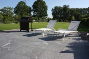 Outdoor Terrace in Sunlight Shows Finish of HDG Colo-Grigi Porcelain Pavers - HDG Building Materials