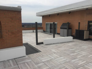 Acacia 60x60 cm Porcelain Pavers Installed Over Pedestals on Raised Terrace