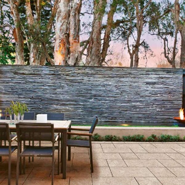 Kaia Tan Porcelain Pavers in Outdoor Terrace with Stone Water Feature