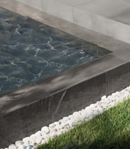 Poolside Application with CC-Moda Black Porcelain Pavers - HDG Building Materials