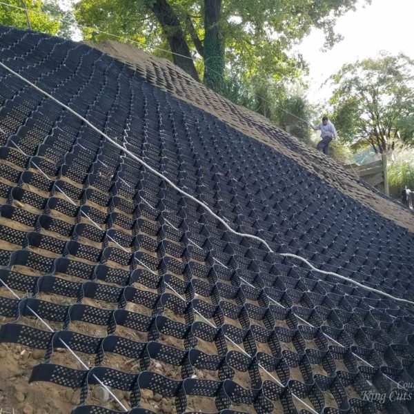 Cabled and Spread SlopeGrid Installed on Steep Slope