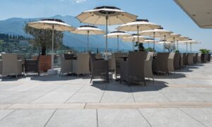 Sierra Grey Porcelain Pavers in Outdoor Dining Application Hospitality Design - HDG Building Materials