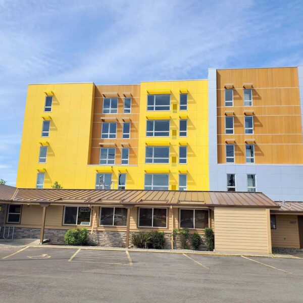 Vertically Set Resysta Cladding on Apartment Building