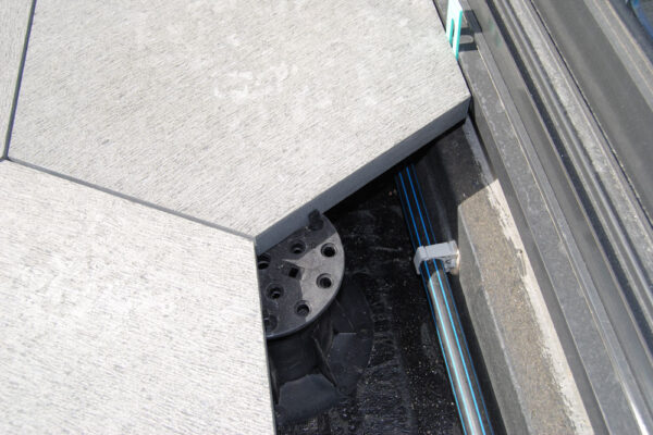 Buzon Pedestals with Spacer Tabs Shows and Services Hidden Below Decking Surface