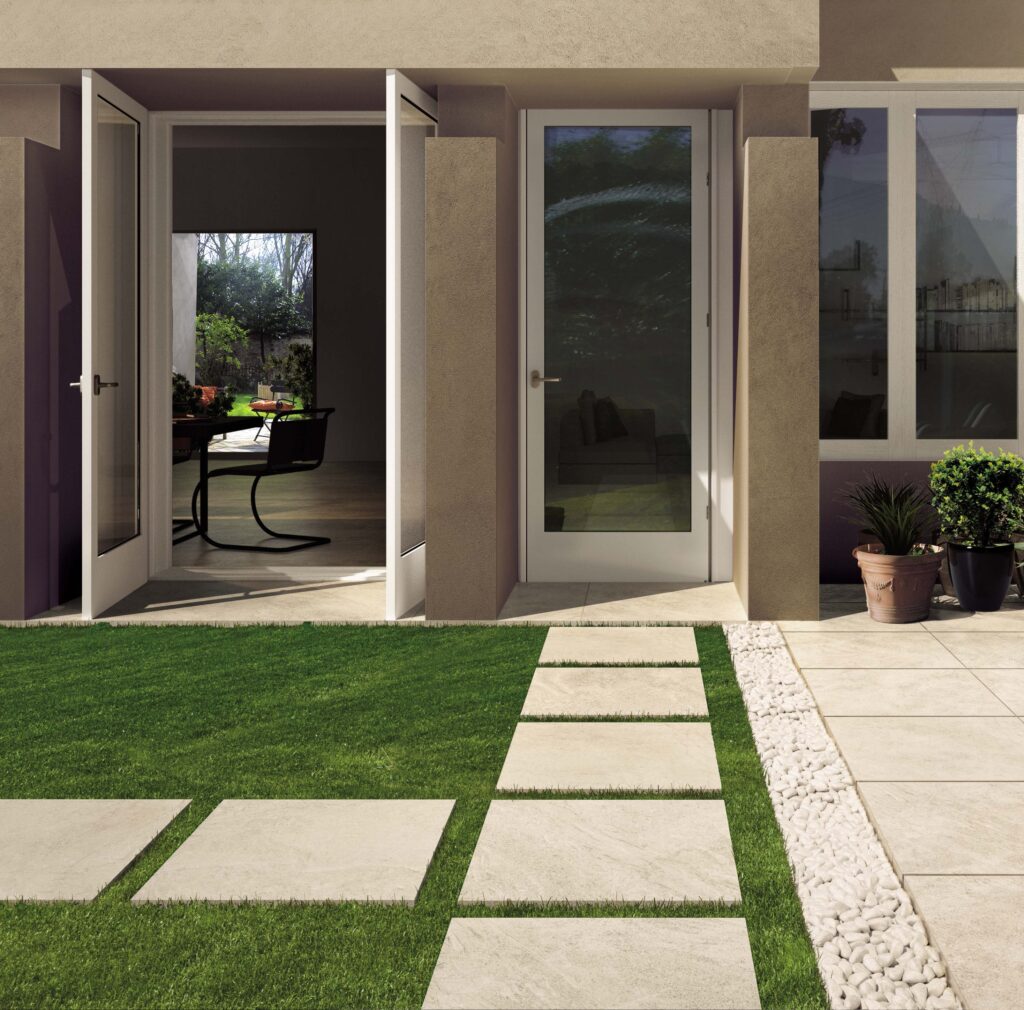 Grass Laid Outdoor Patio with Bianca Porcelain Pavers