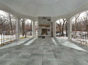 Outdoor Gathering Hall with Fireplace and Fusa Ash Porcelain Pavers