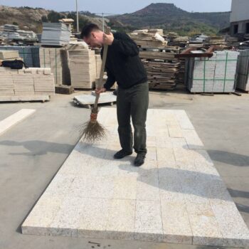 Erik Nelson of HDG Building Materials working in China with Tiger Yellow Granite going to Horton Plaza and HDG Partner