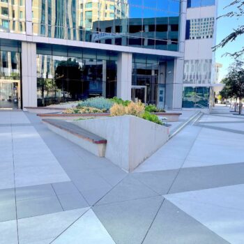 601 City Center with Sloped Surface Design - Buzon Pedestals - Grating Panels - Porcelain Pavers