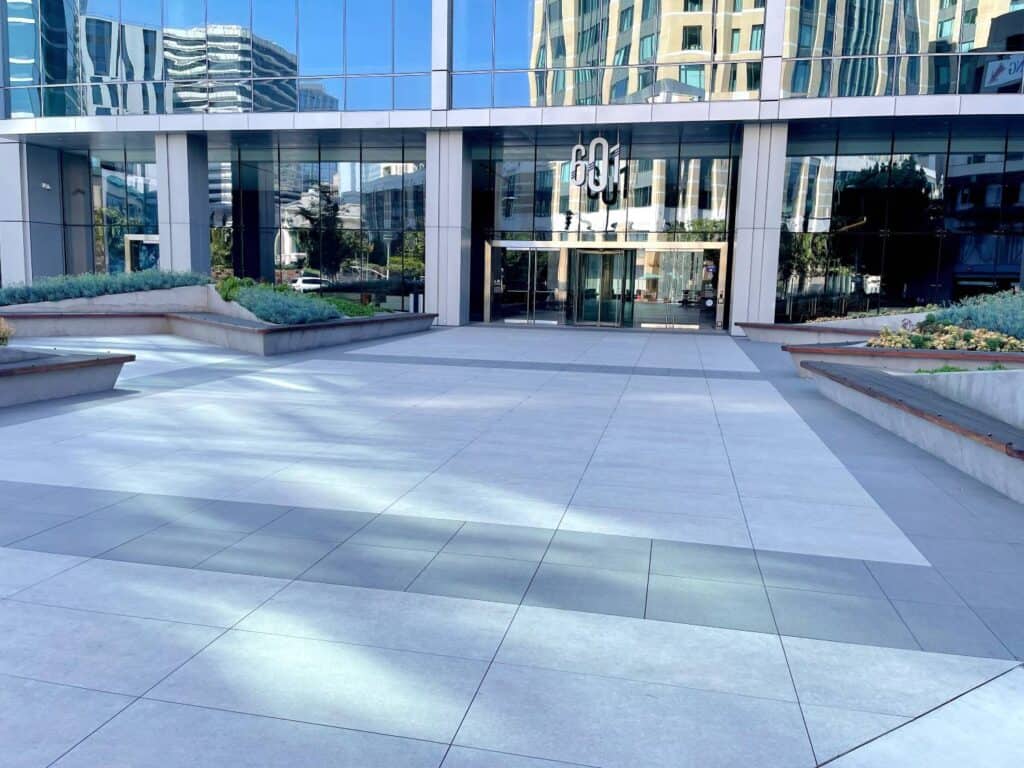 Innovative Pedestal Paver Solution Uses Buzon Pedestals Grating Panels and Porcelain Pavers