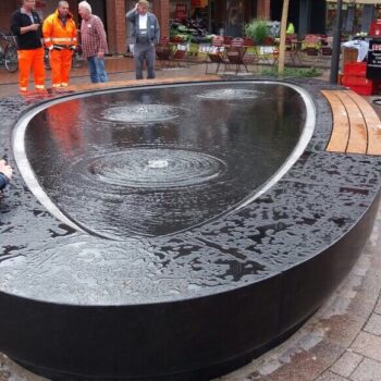 Curvilinear Water-feature Assembly with Black Granite Fabrication