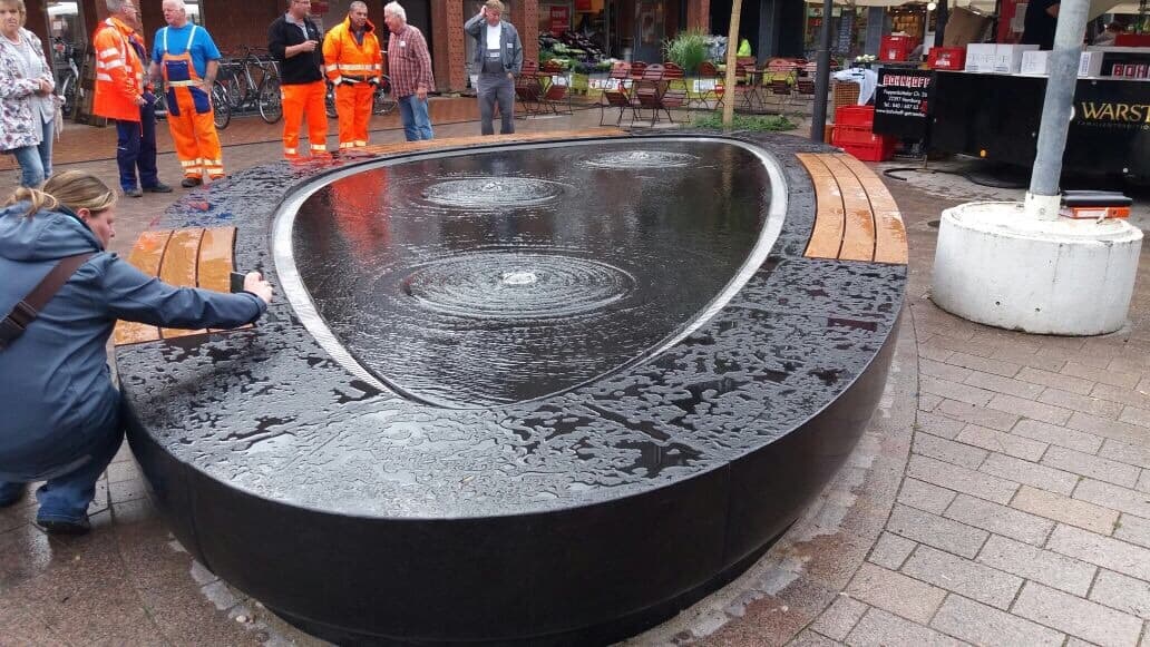 Curvilinear Water-feature Assembly with Black Granite Fabrication