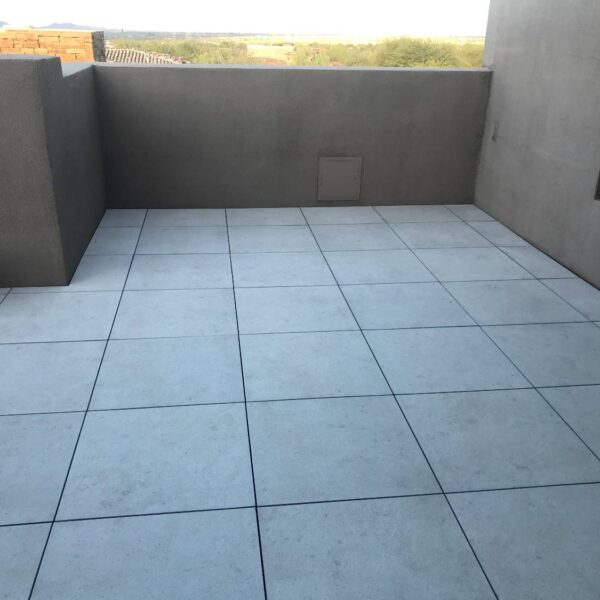 Spacer Tabs Keep Porcelain Pavers Evenly Spaced and Aligned