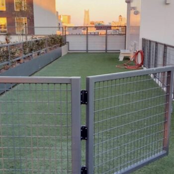 Rooftop Deck is Woof Deck Built with Turf and Mesh Panels