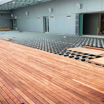 Pedestal Paver System with Board Decking Over Aluminum Joists and Buzon Pedestals