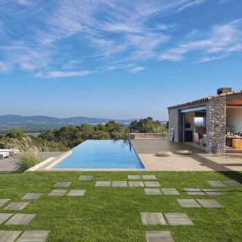 Cindera Light Grey Porcleain Pavers Poolside and In Grass