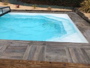 Swimming Pool Surround with Cindera Wood Look Grey Planks Porcelain Paver