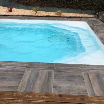 Swimming Pool Surround with Cindera Wood Look Grey Planks Porcelain Paver
