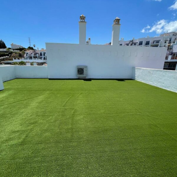 Artificial Turf is Low Maintenance for Rooftop Deck