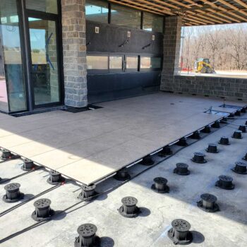 Installing Snow Melt System with ThermaPANEL and Porcelain Pavers Over Buzon Pedestals