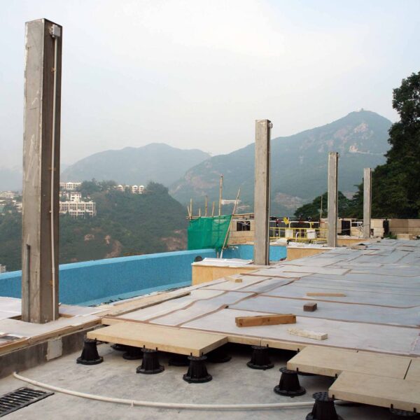 Elevated Stone Deck Uses Buzon Slope Correction System