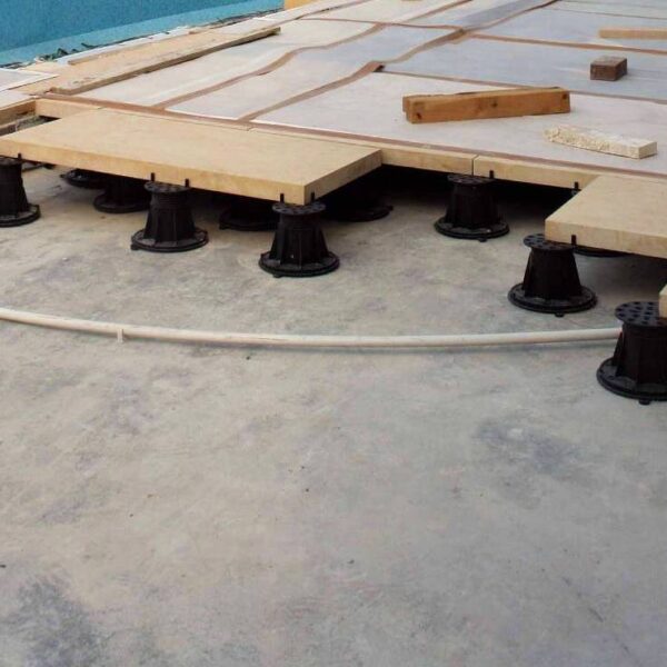 Elevated Buzon Pedestal Deck Hides Services Beneath the Deck Surface