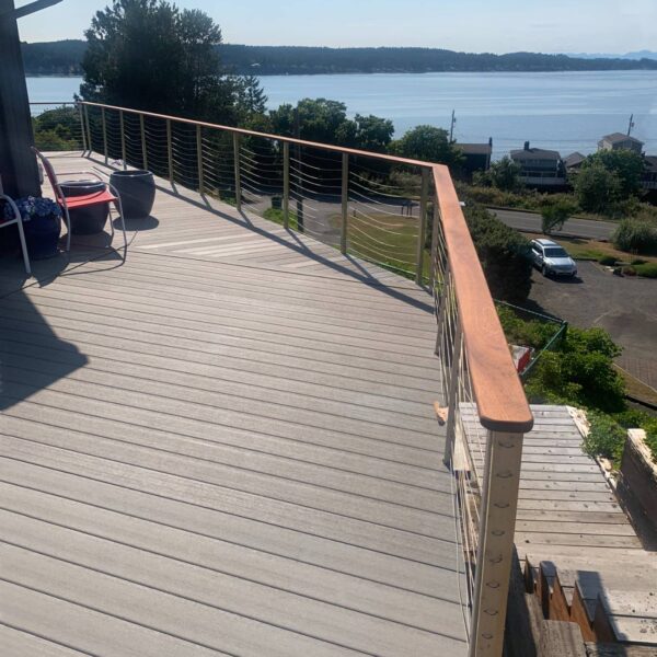 DuxxBak Waterproof Deck with Sapel Wood Top Rail and Stainless Cables
