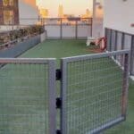 Rooftop Pet Deck with Turf over Grating Panels on top of Buzon Pedestals