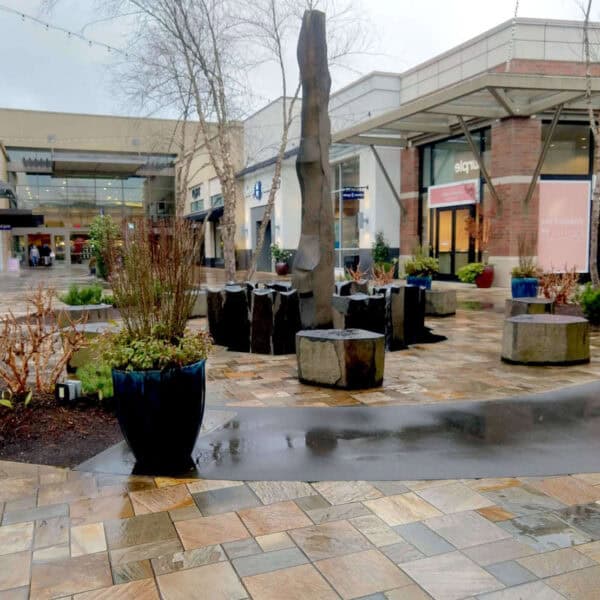 Basalt Stone Water Feature and Natural Stone Pavers Brings Nature to Shopping Mall