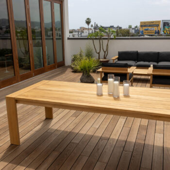 Rooftop Deck Design Shows Visual Contrast between Thermo Ash Decking and Furniture and Wood Cladded Glass Panel Doors
