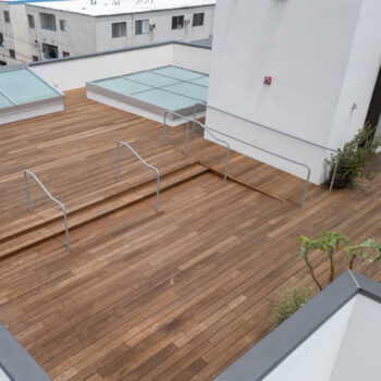 Rooftop Deck Showing Stairs and Accessible Ramp Using Thermo Ash Decking and Buzon Pedestals