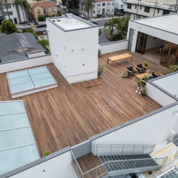 Rooftop Deck with Glass Panel Doors Open and Showing Transition from Interior to Exterior ThermoAsh Raised Floor Decking