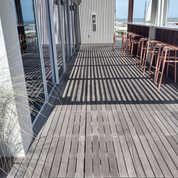 Ipe Wood Pavers Between Bar and Building on Rooftop Deck at Hotel Lucine