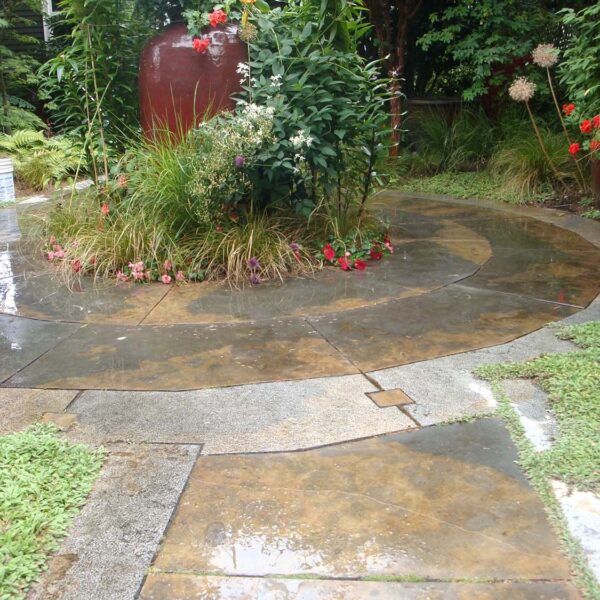 Rusty Caviar Blue Limestone Patio Features Honed and Lychee Finishes